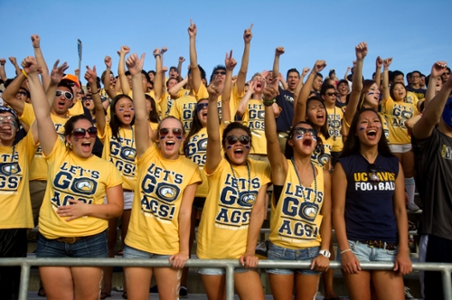 Students cheering at the Aggie Stadium